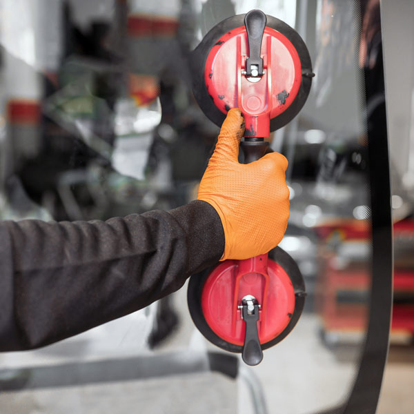 close up of windshield replacement suction cups